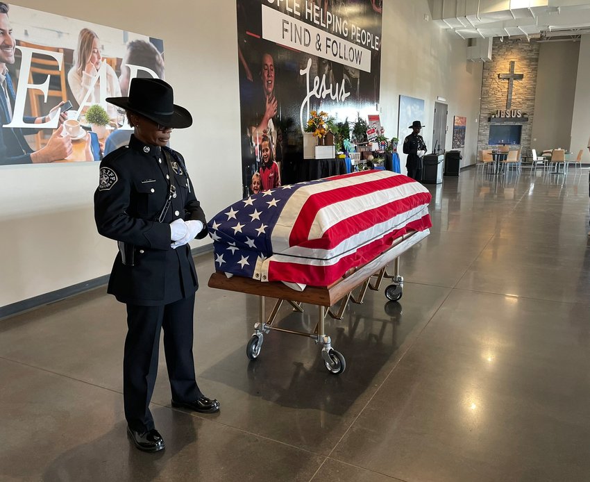 The casket of Brighton police Cmdr. Frank Acosta arrives at Orchard Church shortly before his Sept. 29 funeral service. Acosta died Sept. 23.